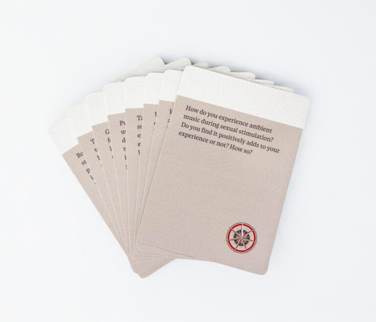 White cards from the Sex Deck fanned out
